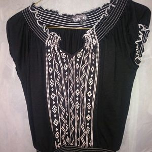 black blouse with white pattern